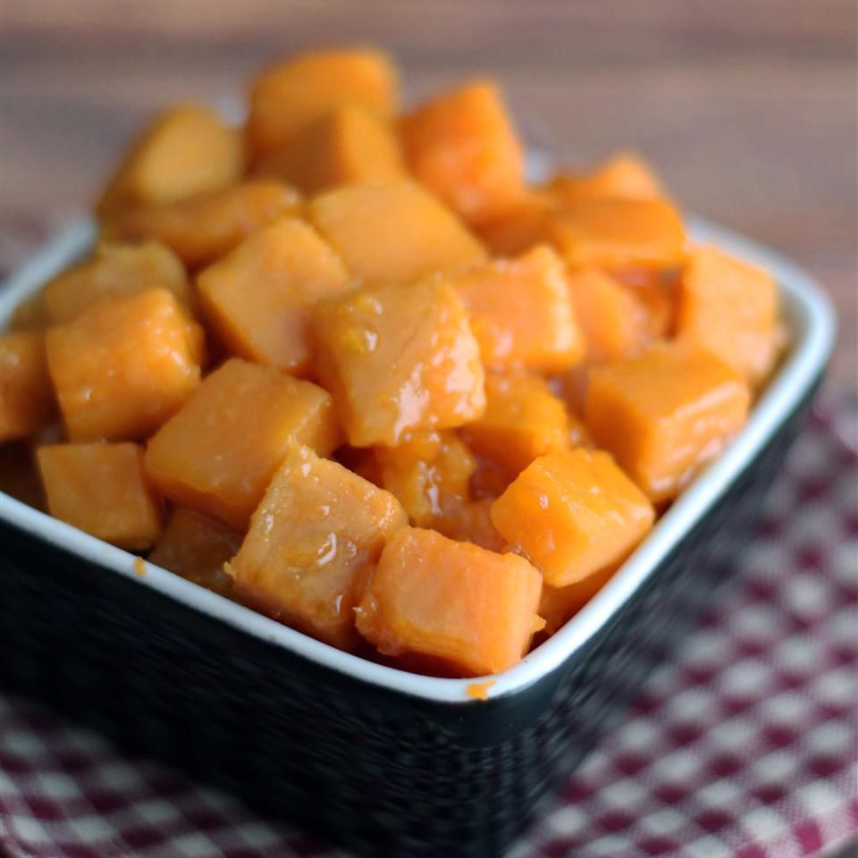 orange-glazed sweet potatoes in a square dish