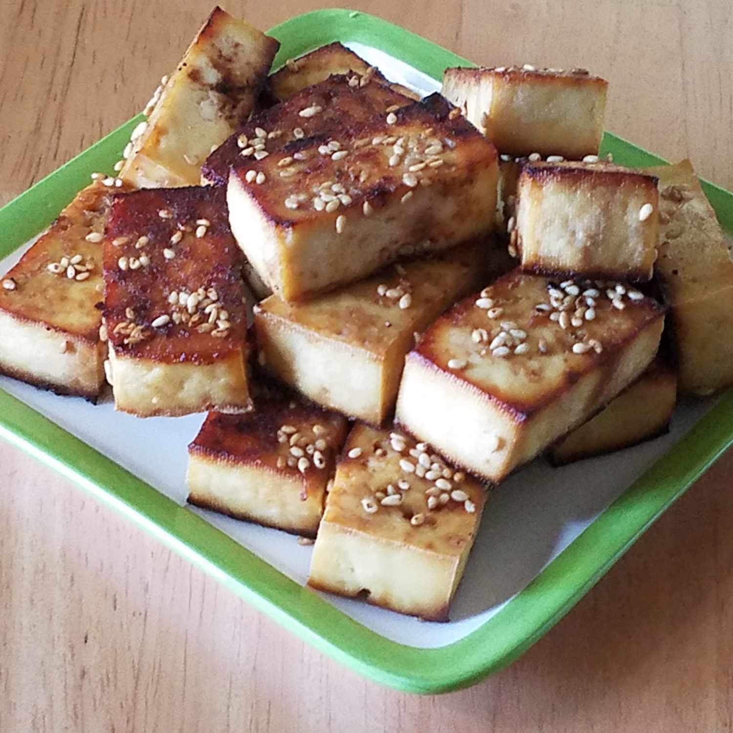 Baked Tofu on a green plate