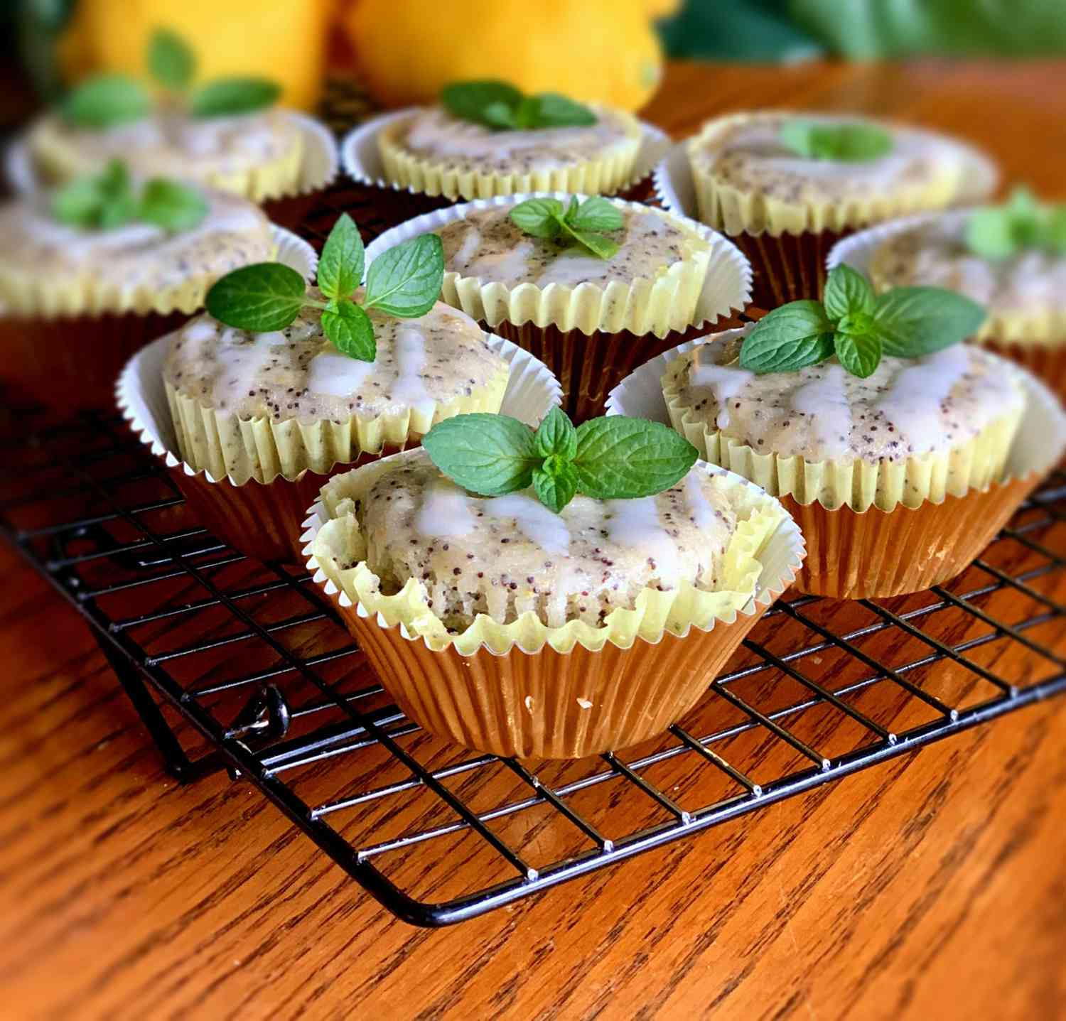 Vegan Lemon-Poppy Seed Muffins on a cooling rack
