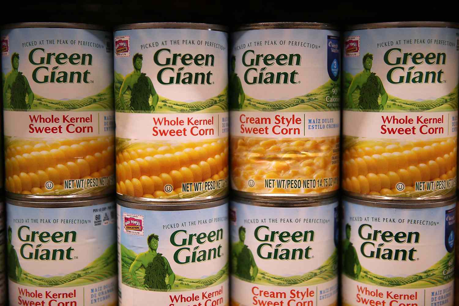 Canned sweet corn on a supermarket shelf