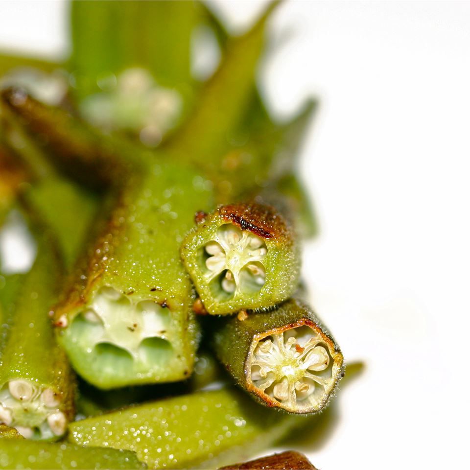 roasted okra on a white surface