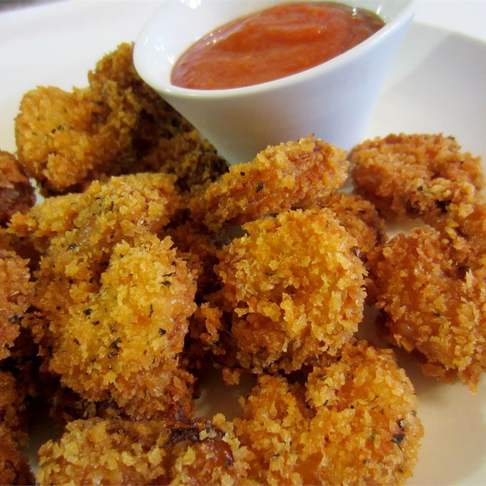 fried shrimp with ketchup on the side