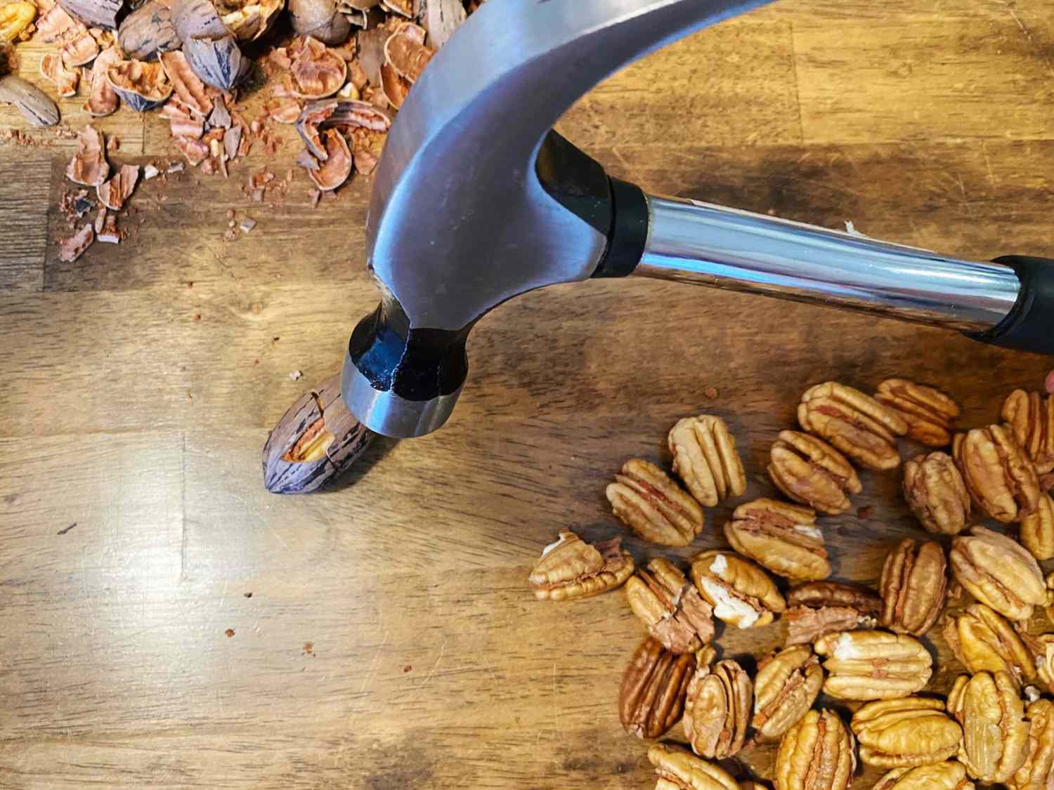 Cracking pecan with hammer