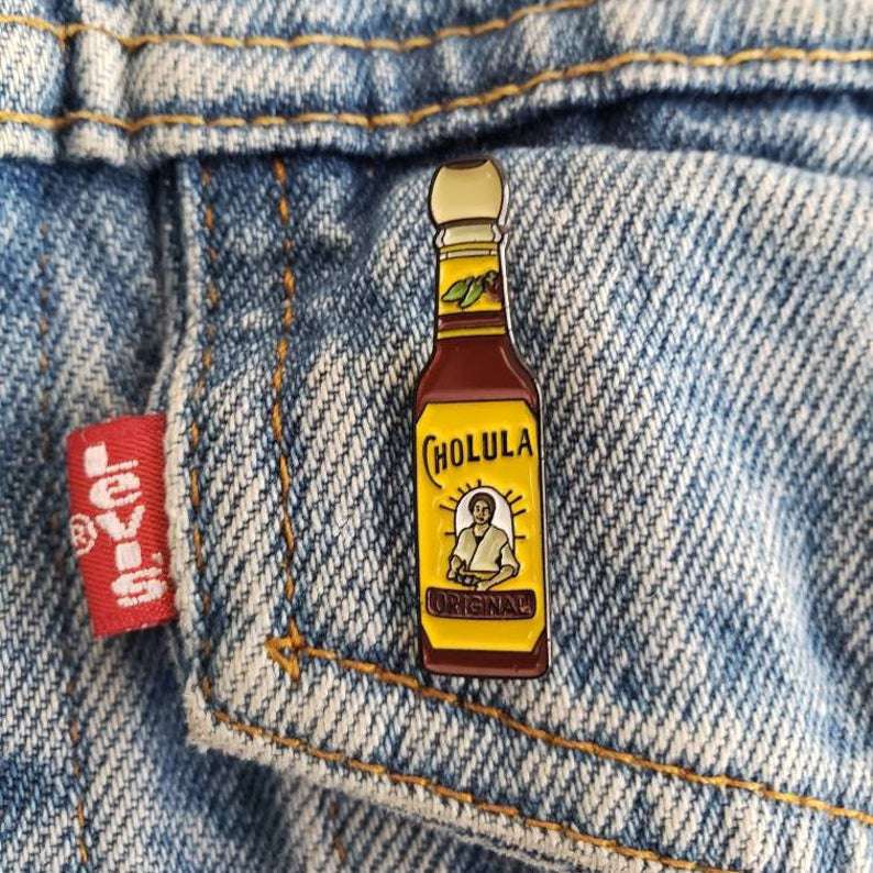 Cholula bottle pin on jeans