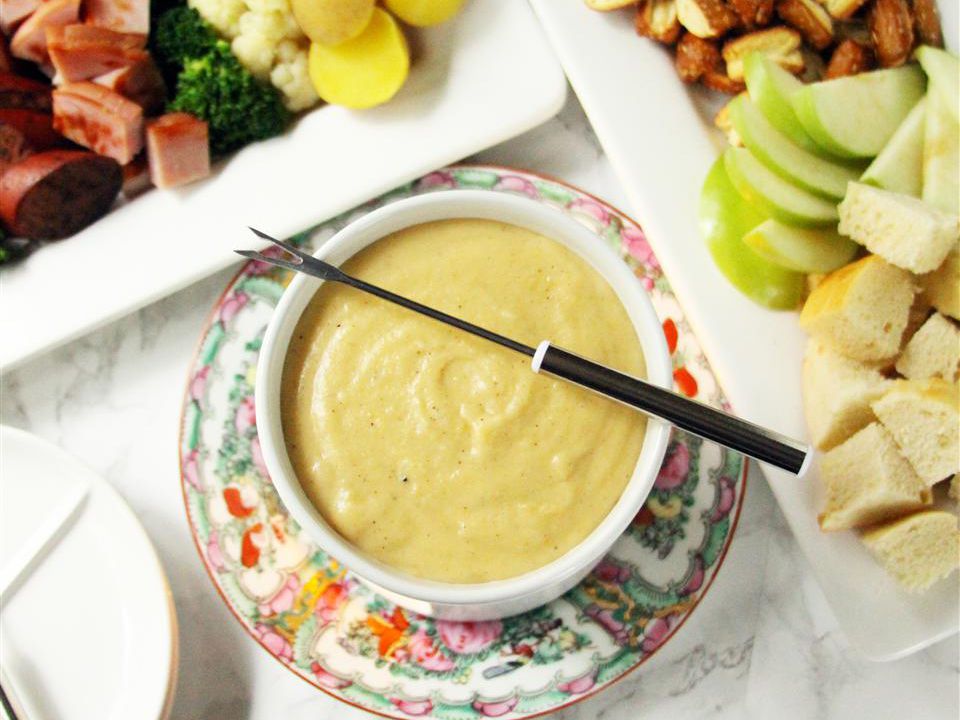 Cheese Fondue on a floral plate
