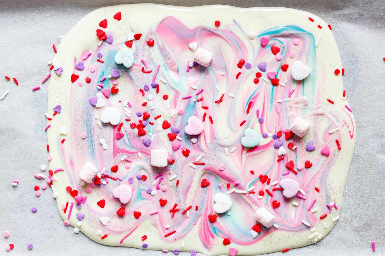 slab of unicorn bark - white chocolate topped with sprinkles and candy
