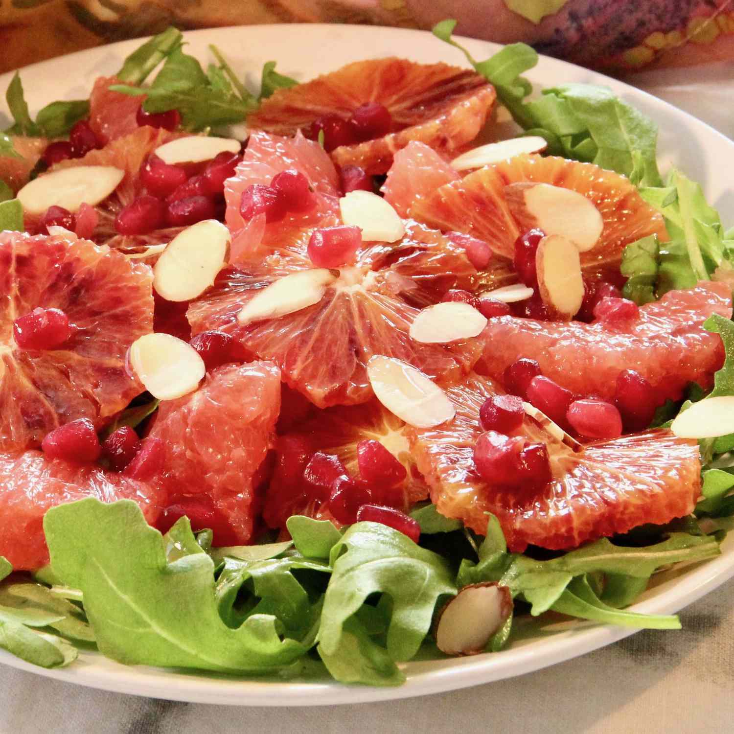 salad with blood orange and grapefruit with almond slivers on top