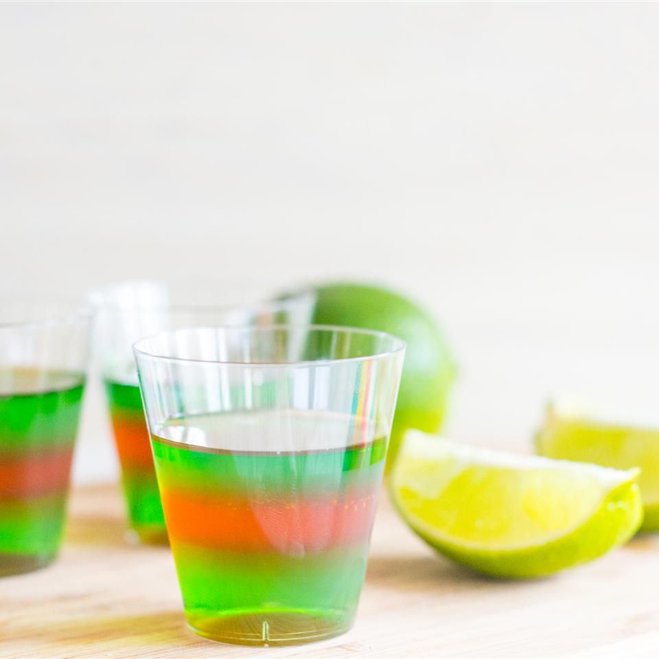 Layered Margarita Jell-O Shots with fresh limes