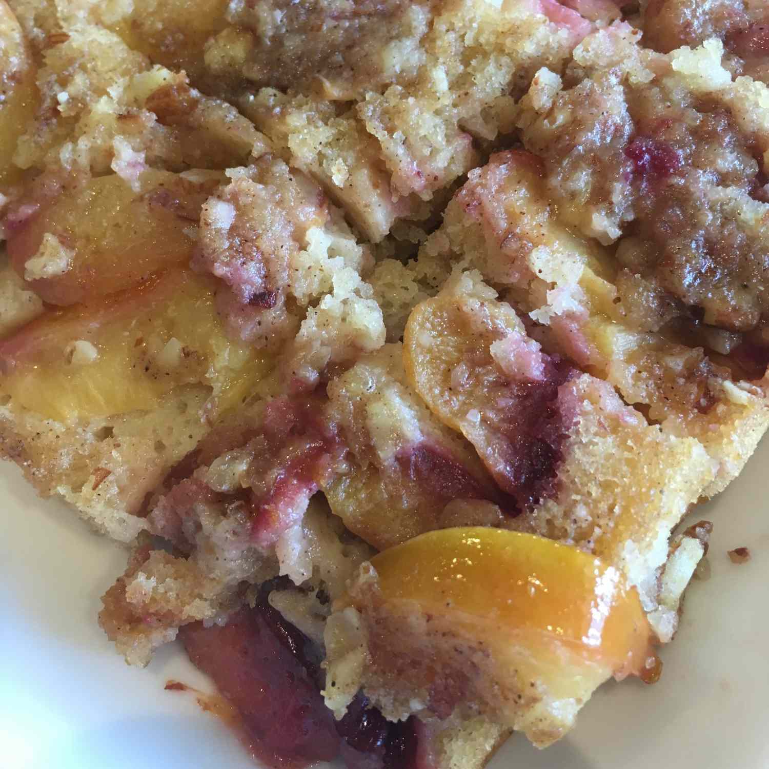 Plum Upside-Down Cake on a white plate