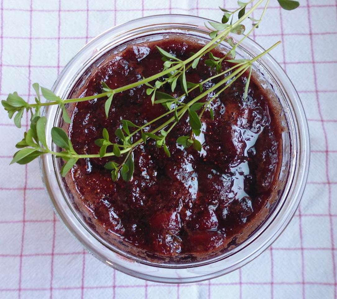 strawberry jam with balsamic vinegar and sprigs of fresh thyme