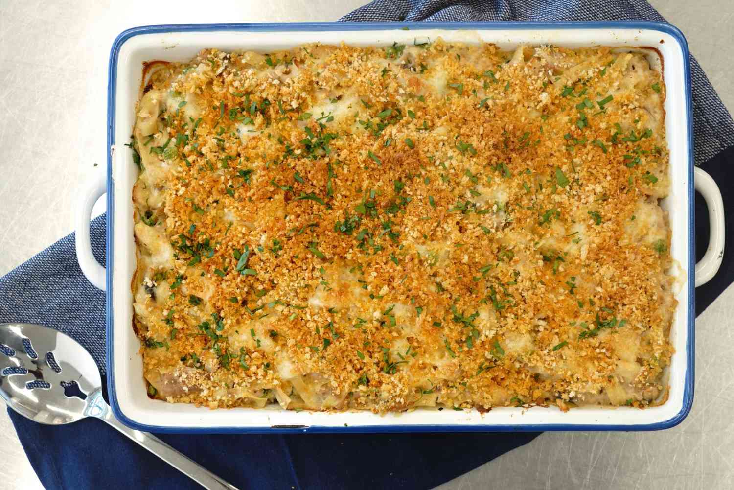 overhead shot of a tuna noodle casserole and serving spoon