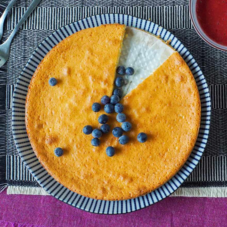cheesecake with blueberries on a blue plate