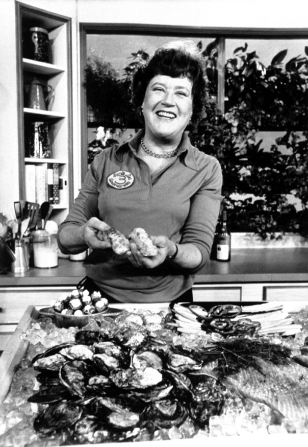 Julia Child on with seafood on the counter on the set of Julia Child and More Company