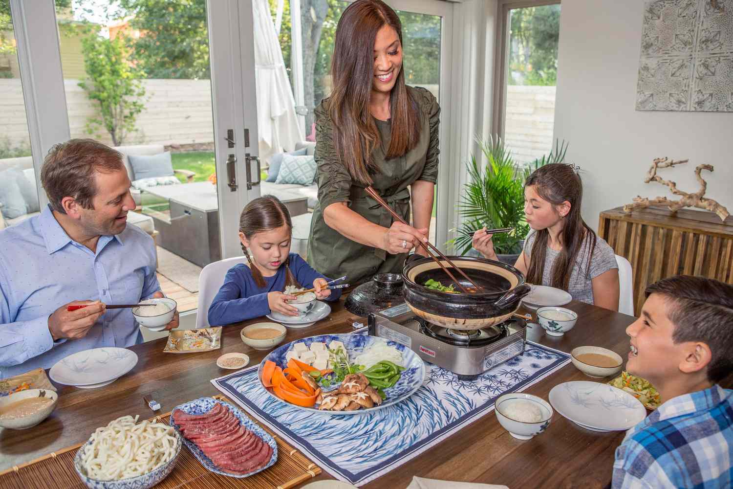 Amy Kimoto-Kahn serves Japanese hot pot