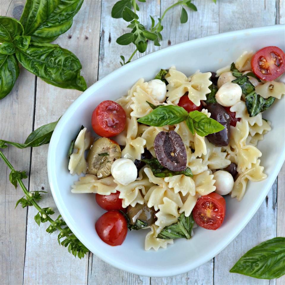 bowtie pasta with tomatoes, olives, mozzarella