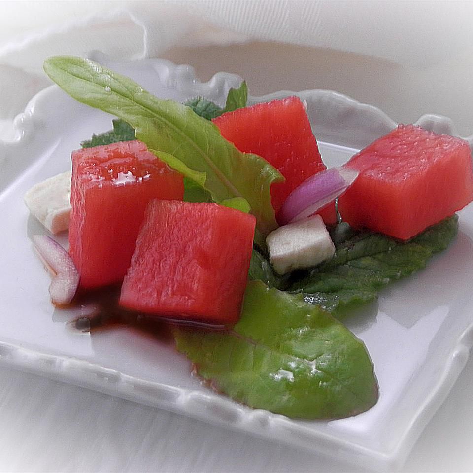 Arugula and Watermelon Salad on a white plate