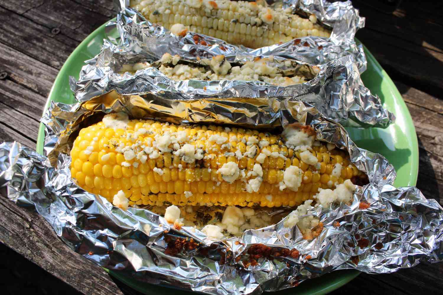 Oven-Roasted Corn on the Cob with Blue Cheese in foil