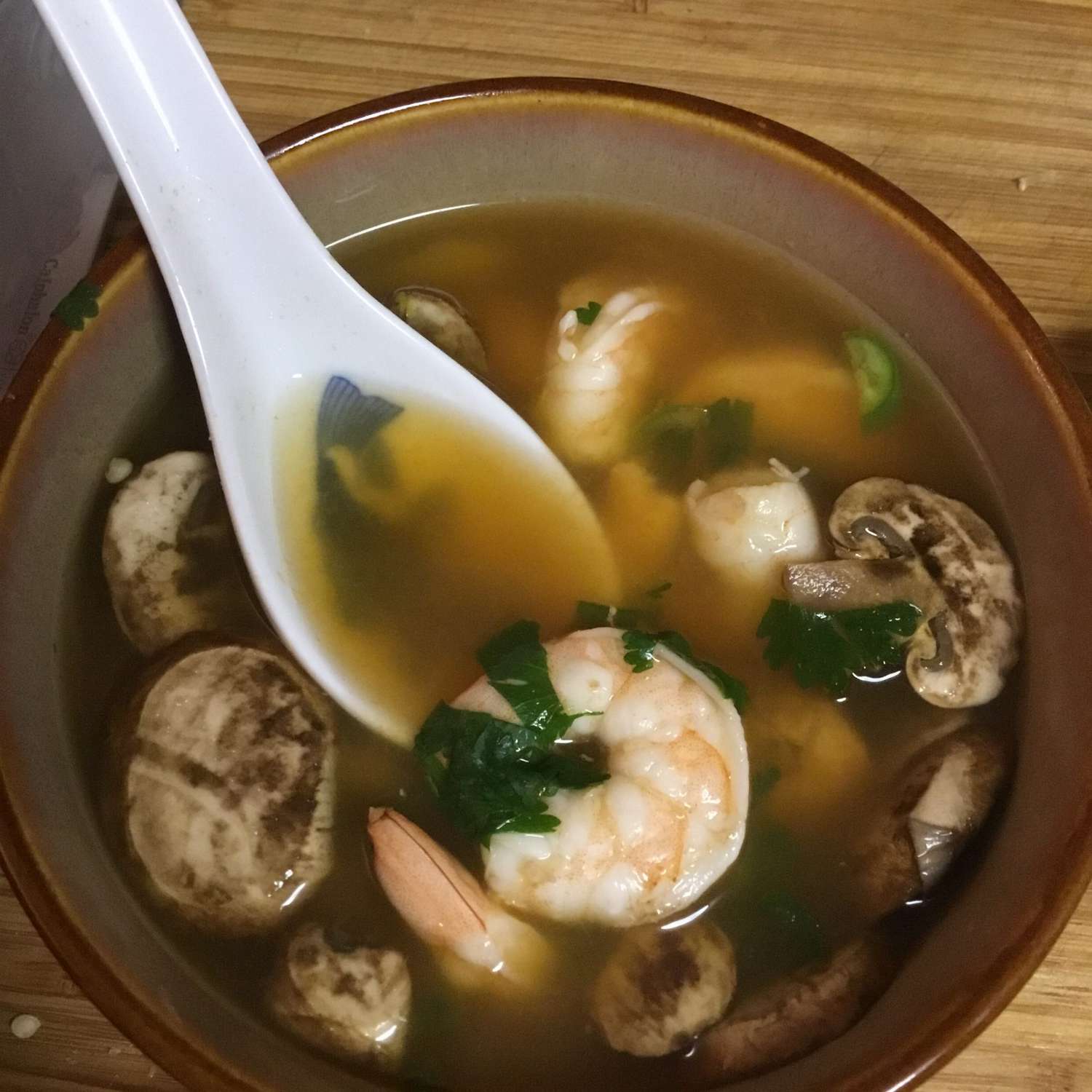 Thai Hot and Sour Soup in a grey bowl