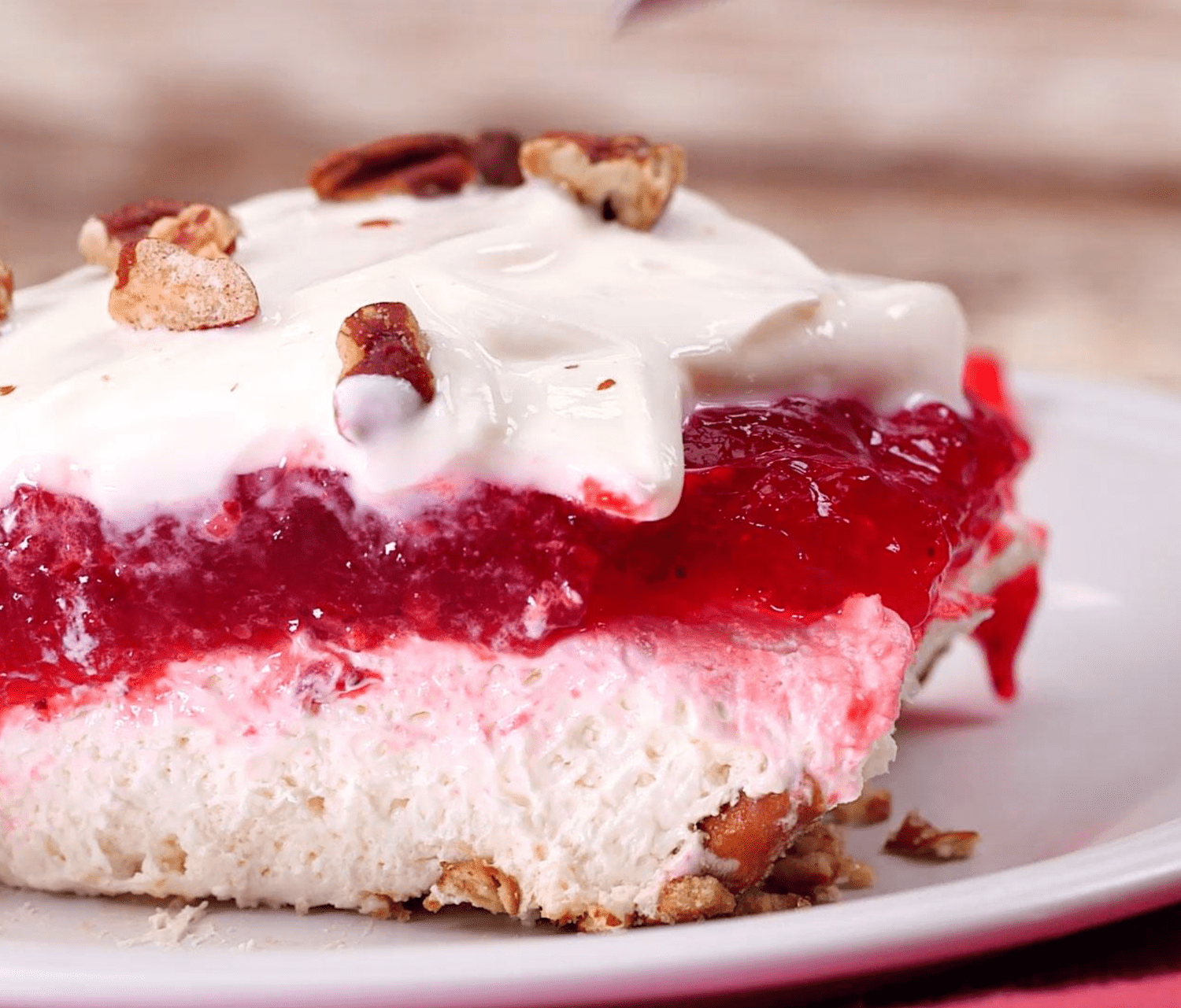 This Strawberry-Pretzel Salad Is A Southern Classic side angle of a slice