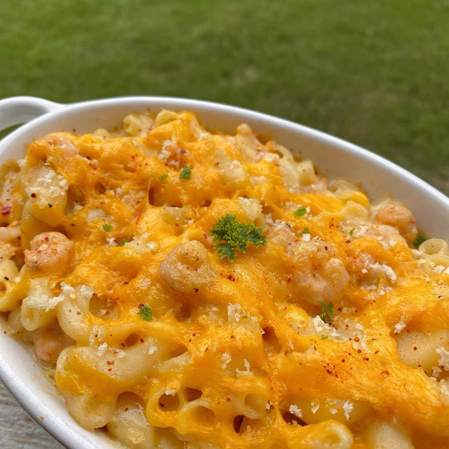 Shrimp Mac and Cheese in a white dish