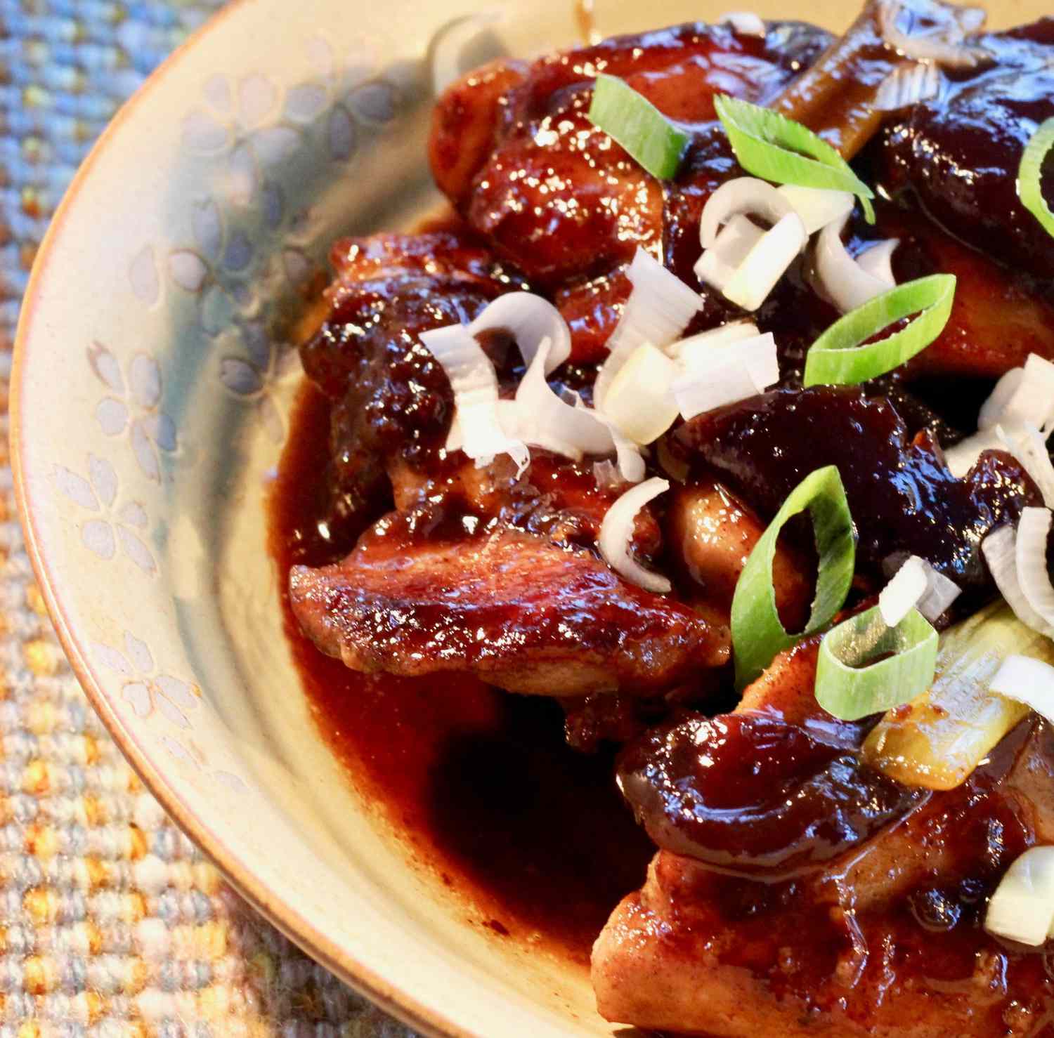 plum glazed chicken thighs with green onions