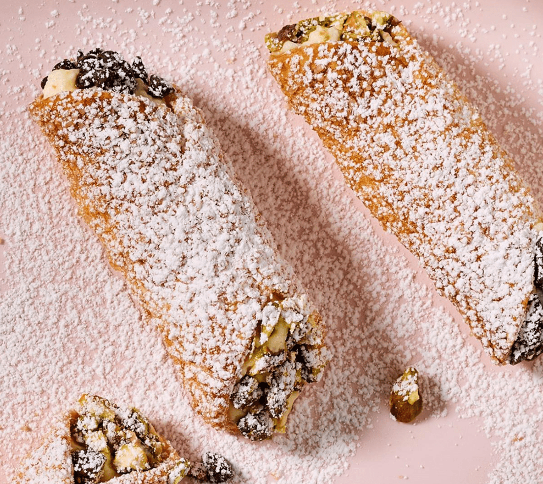 powdered sugar dusted cannolis from the air fryer