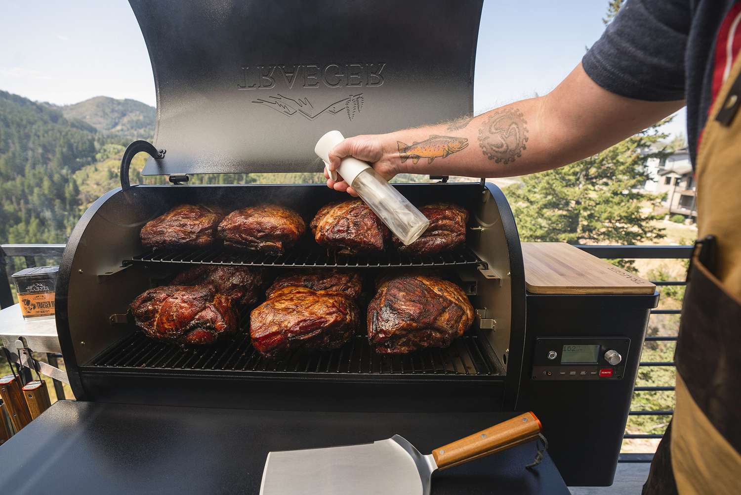 Traeger Ironwood 855 pellet grill loaded up with smoked meats