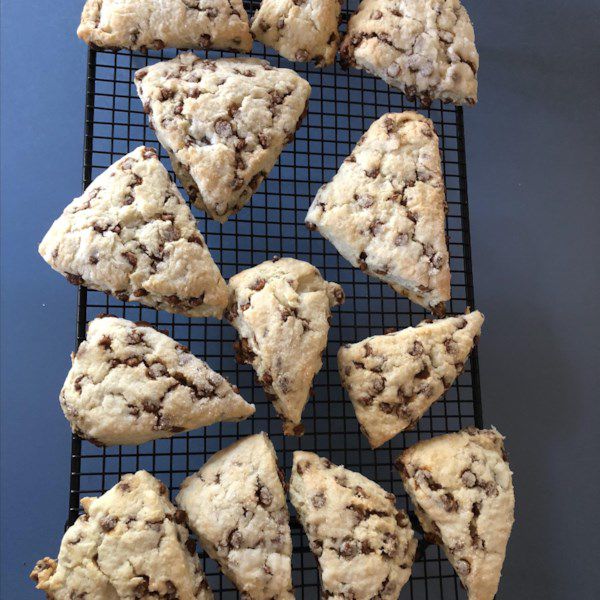 a cooling rack with cinnamon chip scones