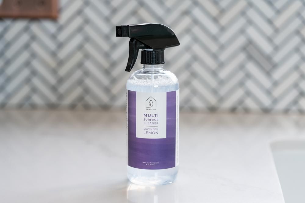 multi purpose cleaner in clear bottle on countertop