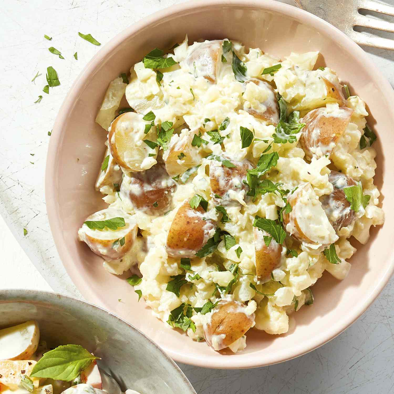 creamy potato salad with cauliflower rice in it