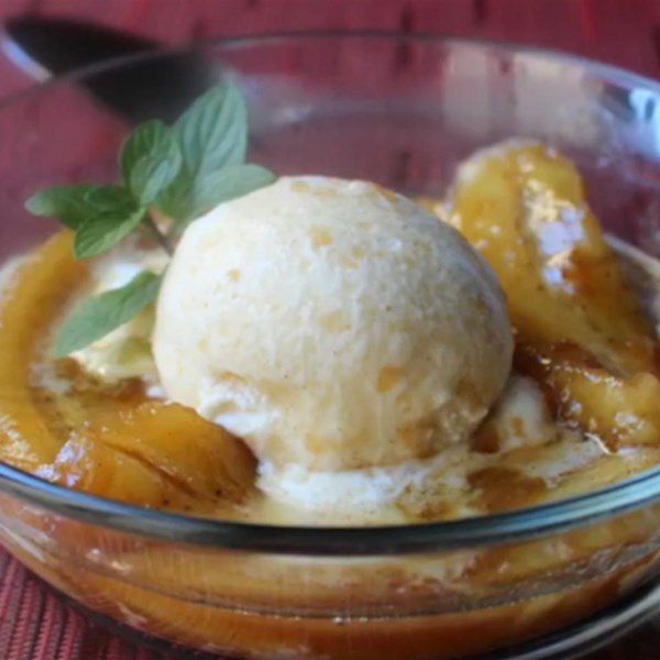 bananas foster with vanilla ice cream in a bowl