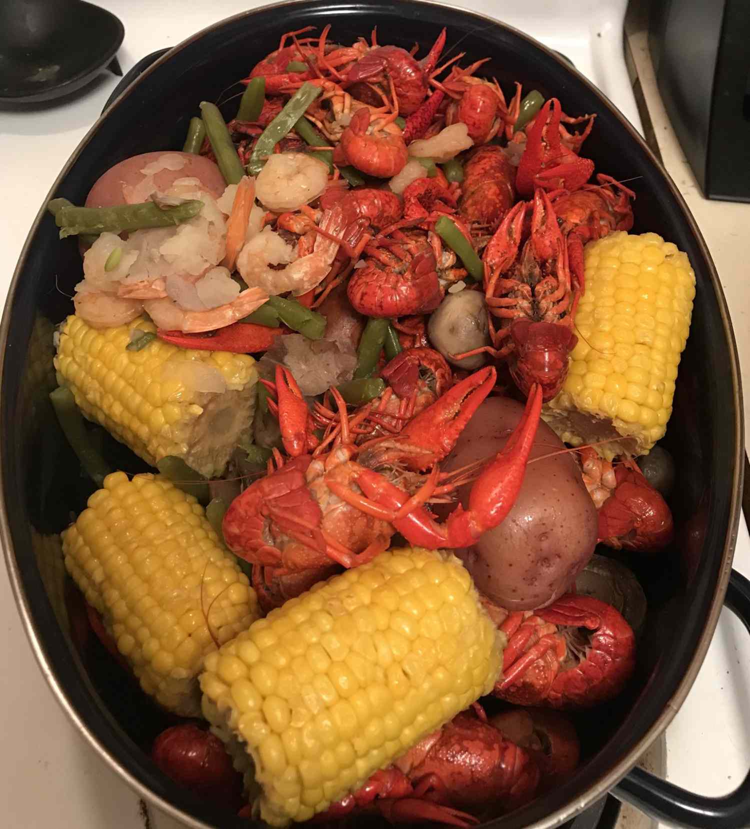 <p>Don't worry, we're not forgetting freshwater fare just because this is a roundup of seafood boils. This Louisiana-style crawfish boil is best served without utensils on a picnic table covered with old newspaper. </p>
                          