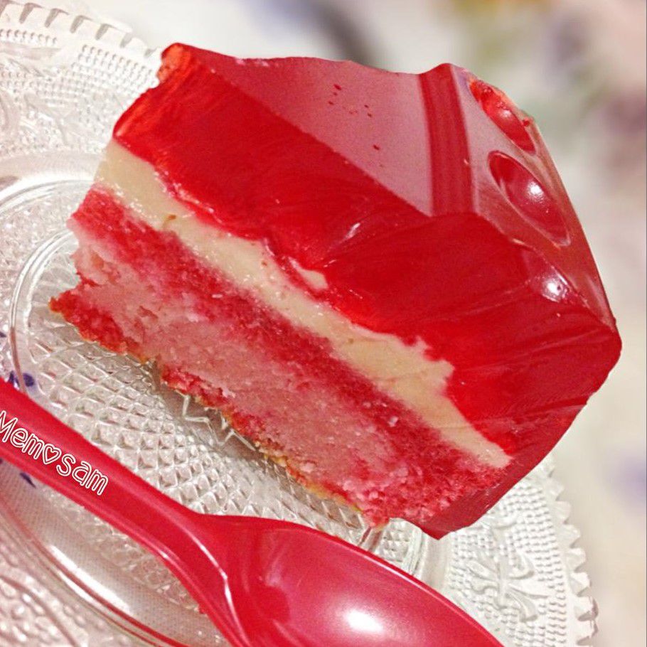 slice of strawberry jello flan cake