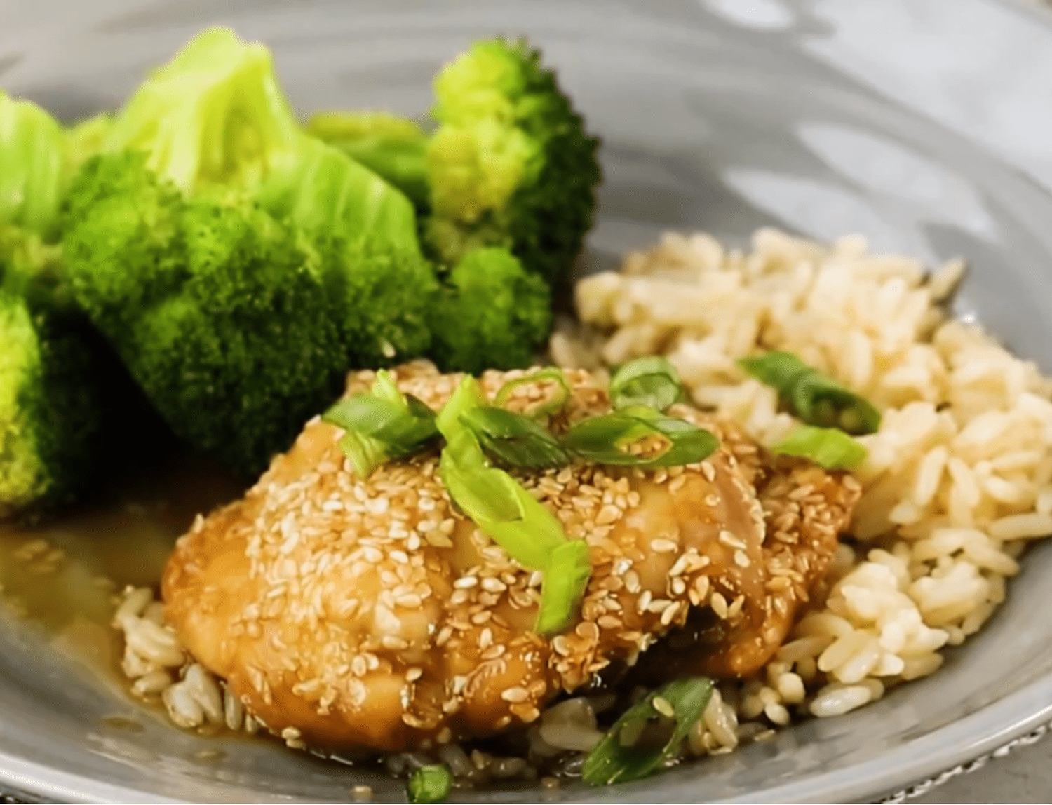 Sticky Sesame Chicken with broccoli and rice