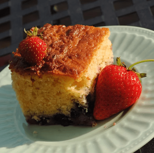 <p>A selection of sweet, fresh berries are topped with a rich cake batter made with yellow cornmeal, eggs, condensed milk, and vanilla. "I really enjoyed this recipe," says an anonymous reviewer. "The taste and texture were both delicious. I used fresh strawberries and frozen blackberries."</p>
                          