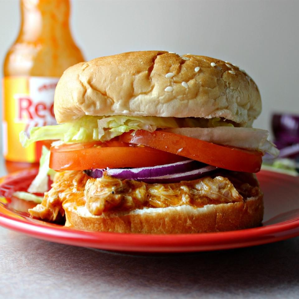Slow Cooker Buffalo Chicken Sandwiches on a red plate