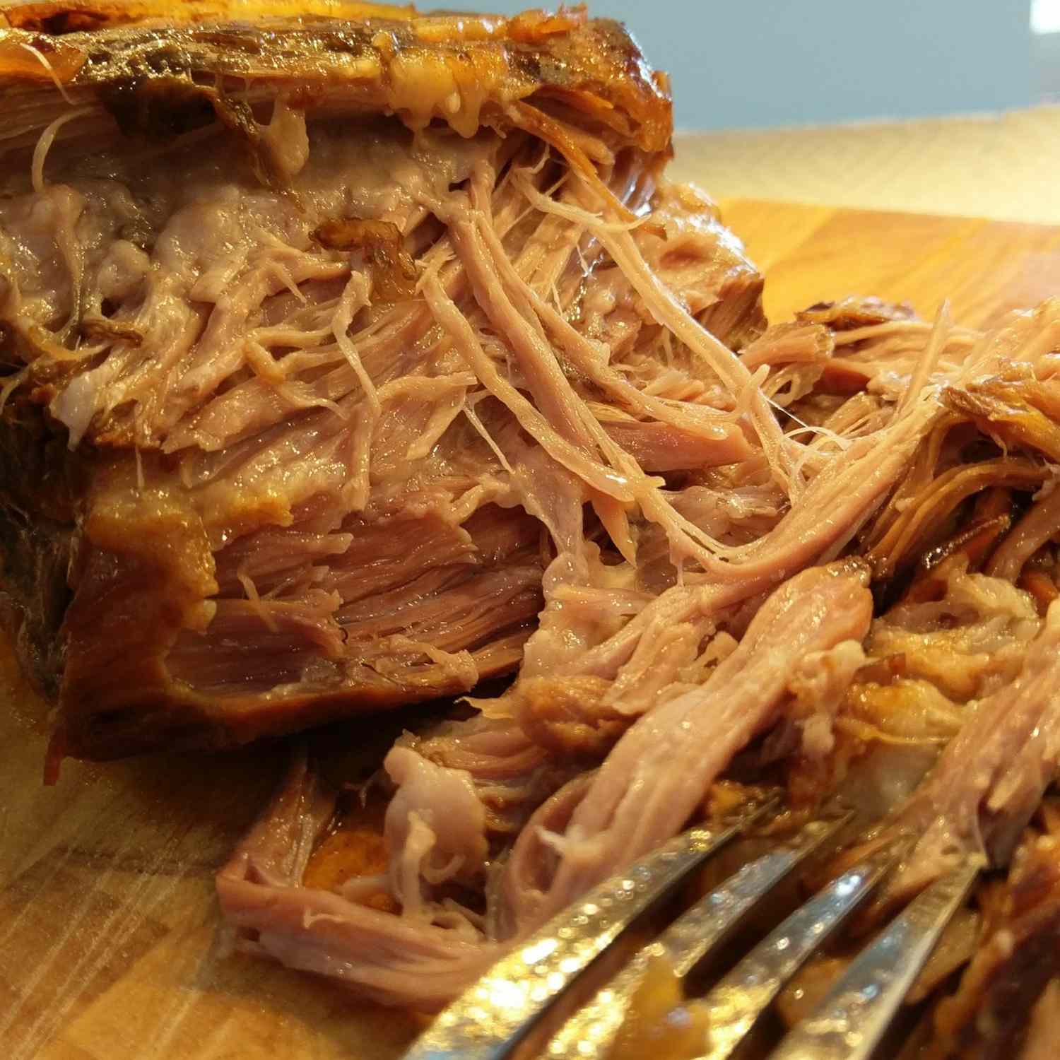 Southern Yank Pulled Pork BBQ on a wooden cutting board