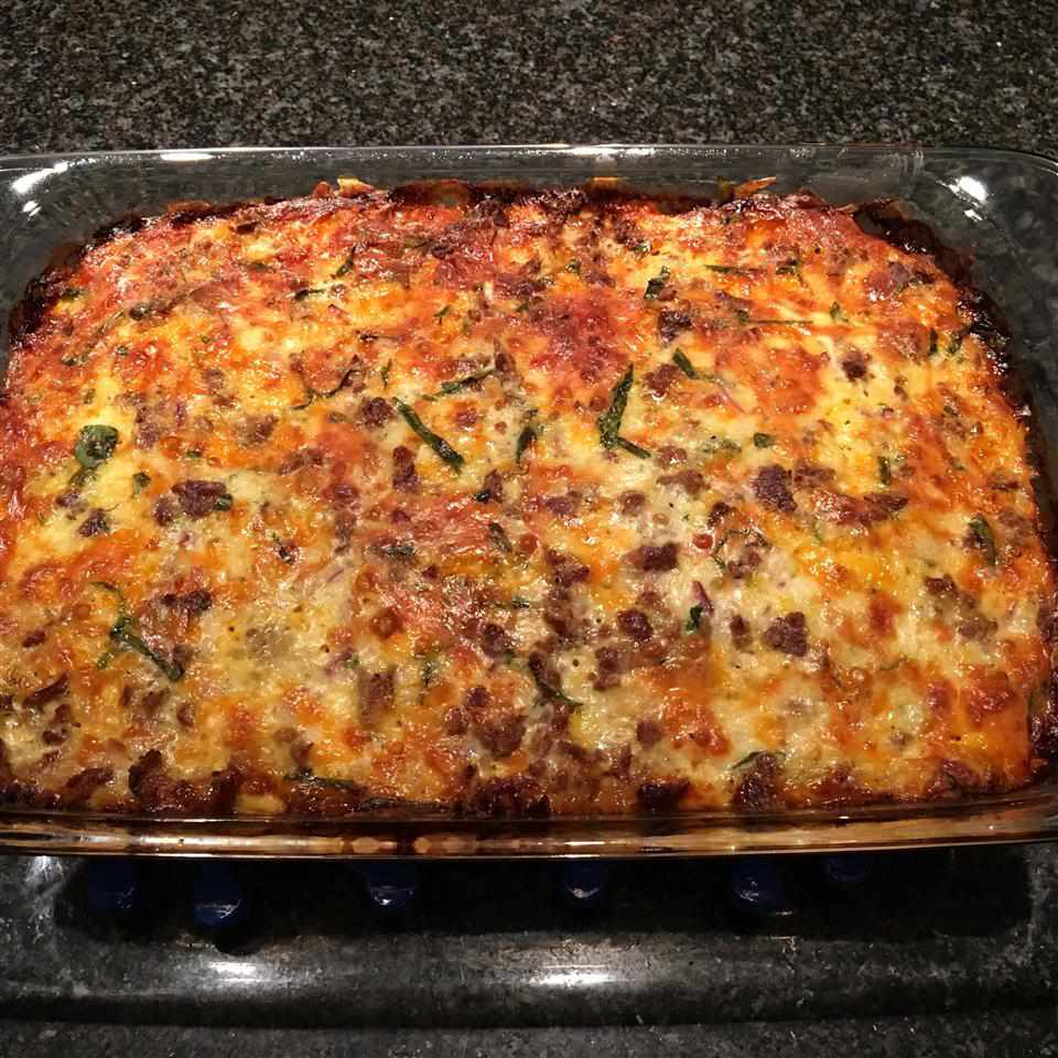 <p>A very versatile and filling breakfast casserole made with eggs, cheese, vegetarian sausage, spinach, and sweet potatoes. "I enjoyed the sweet and savory aspect of this dish," says home cook Victoria Gochenauer. "Garnished with avocado and tomato. Delish! Will definitely make again!"</p>
                          