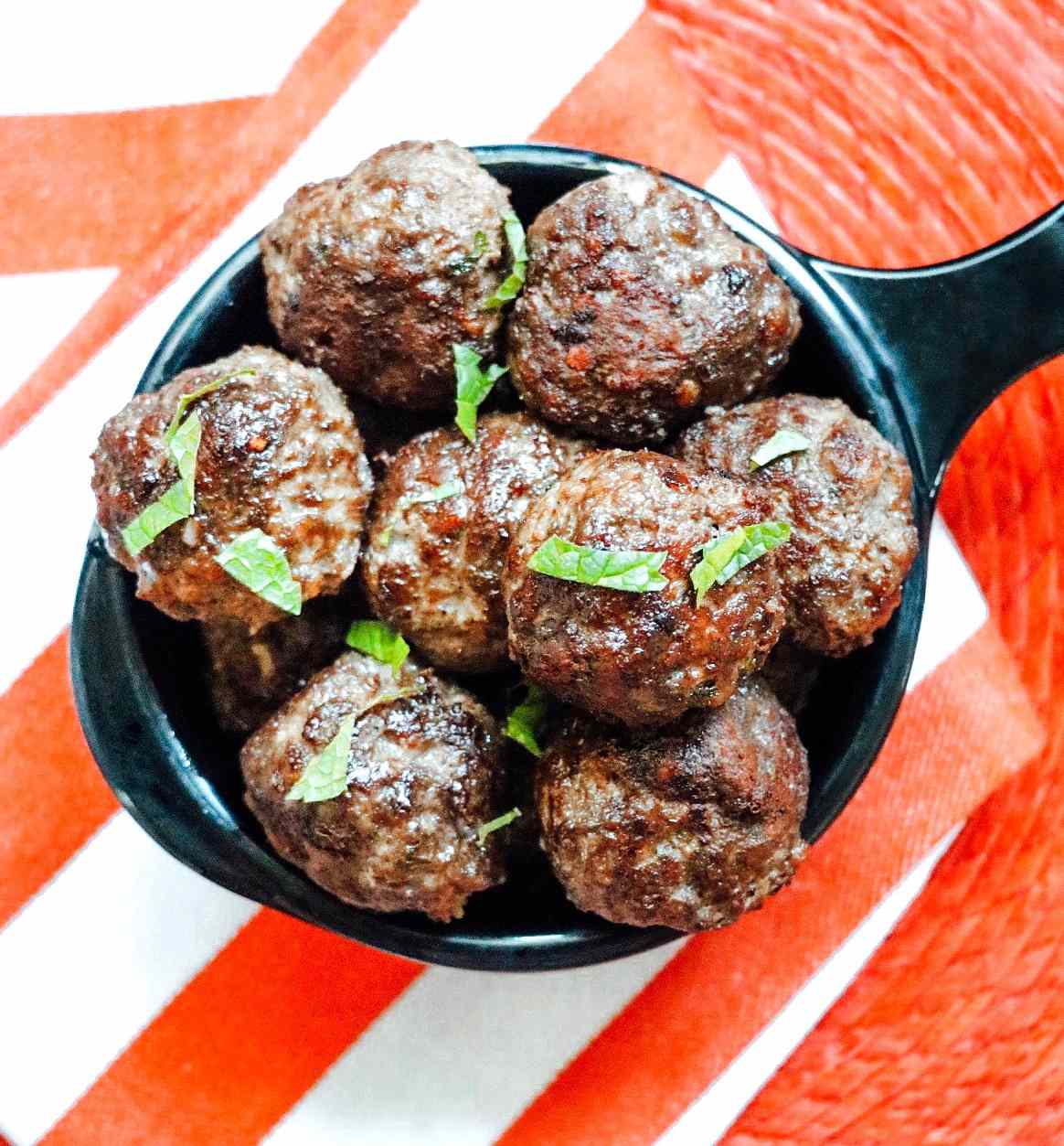 <p>These Turkish meatballs come together quickly because they are made using the food processor to crumble the bread and thoroughly mix all the ingredients. While the meatballs should be served soon after cooking, the mixture can be refrigerated for an hour before frying them. A garnish of fresh chopped mint or parsley makes an attractive presentation.</p>
                          