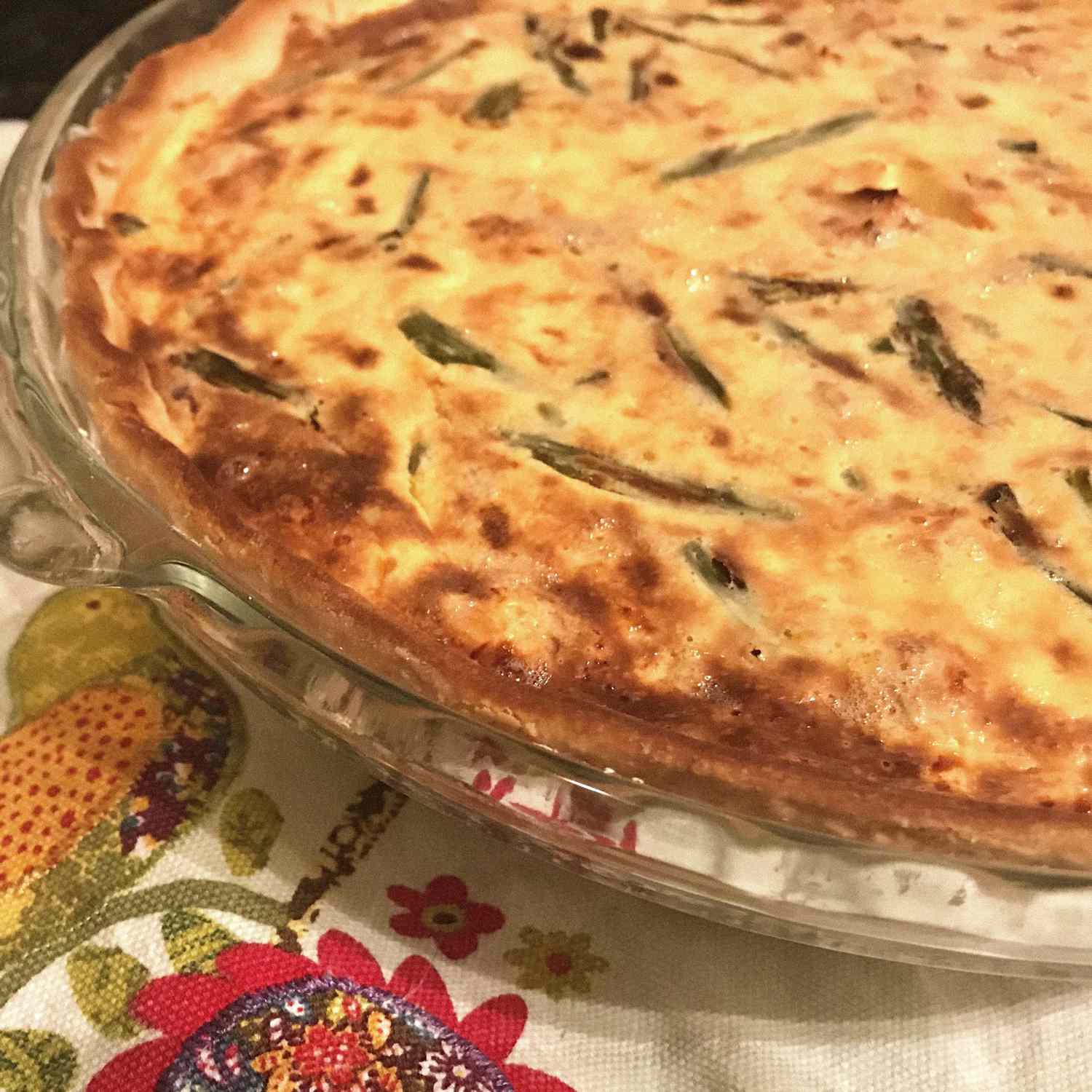 Easy Salmon and Asparagus Quiche in a glass pan