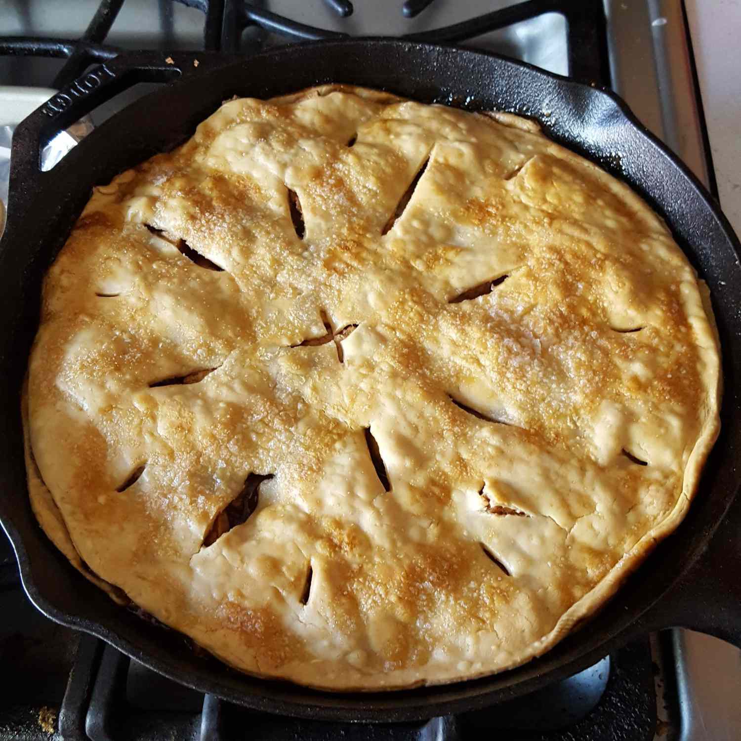 close up of Grandma's Iron Skillet Apple Pie in a cast iron skillet