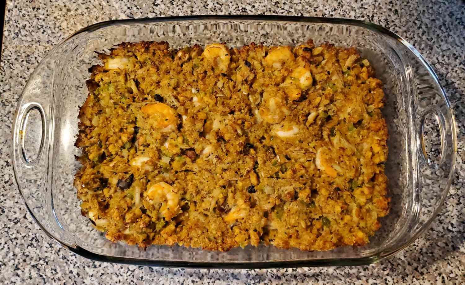 seafood stuffing in glass casserole dish