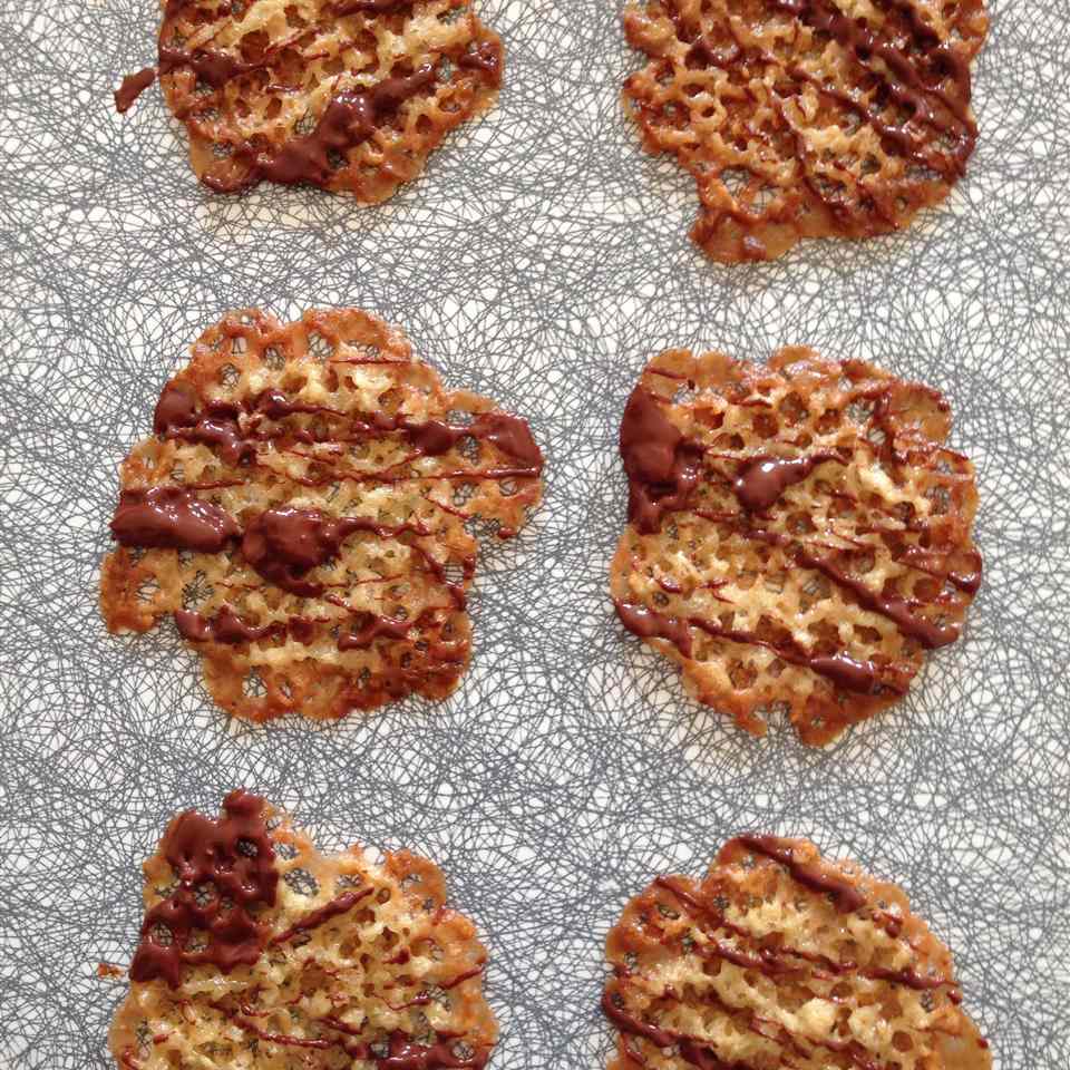 Oatmeal Lace Cookies on a grey background