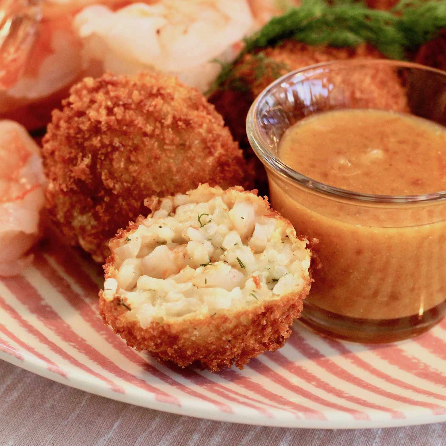 croquettes with prawns and rice inside and dipping sauce