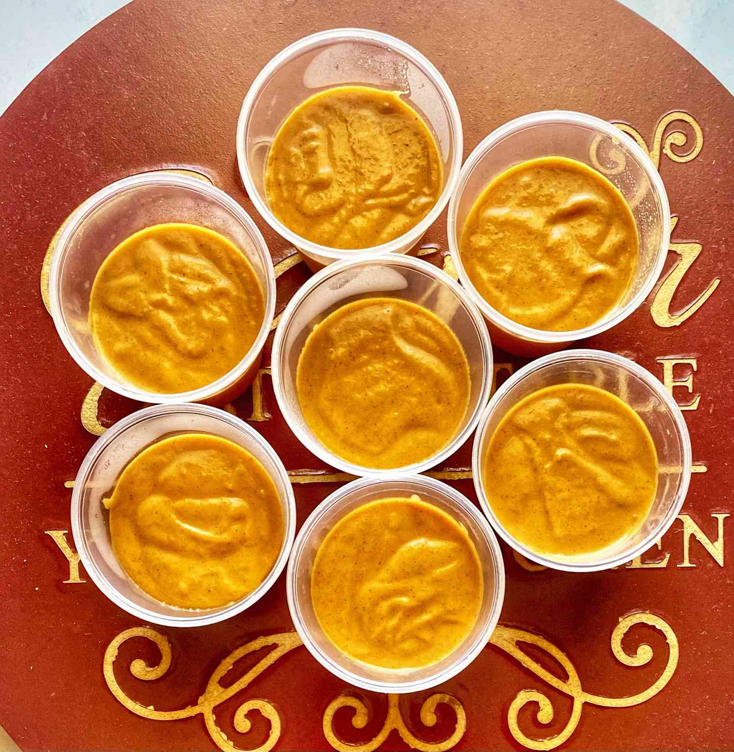plastic cups with pumpkin mousse