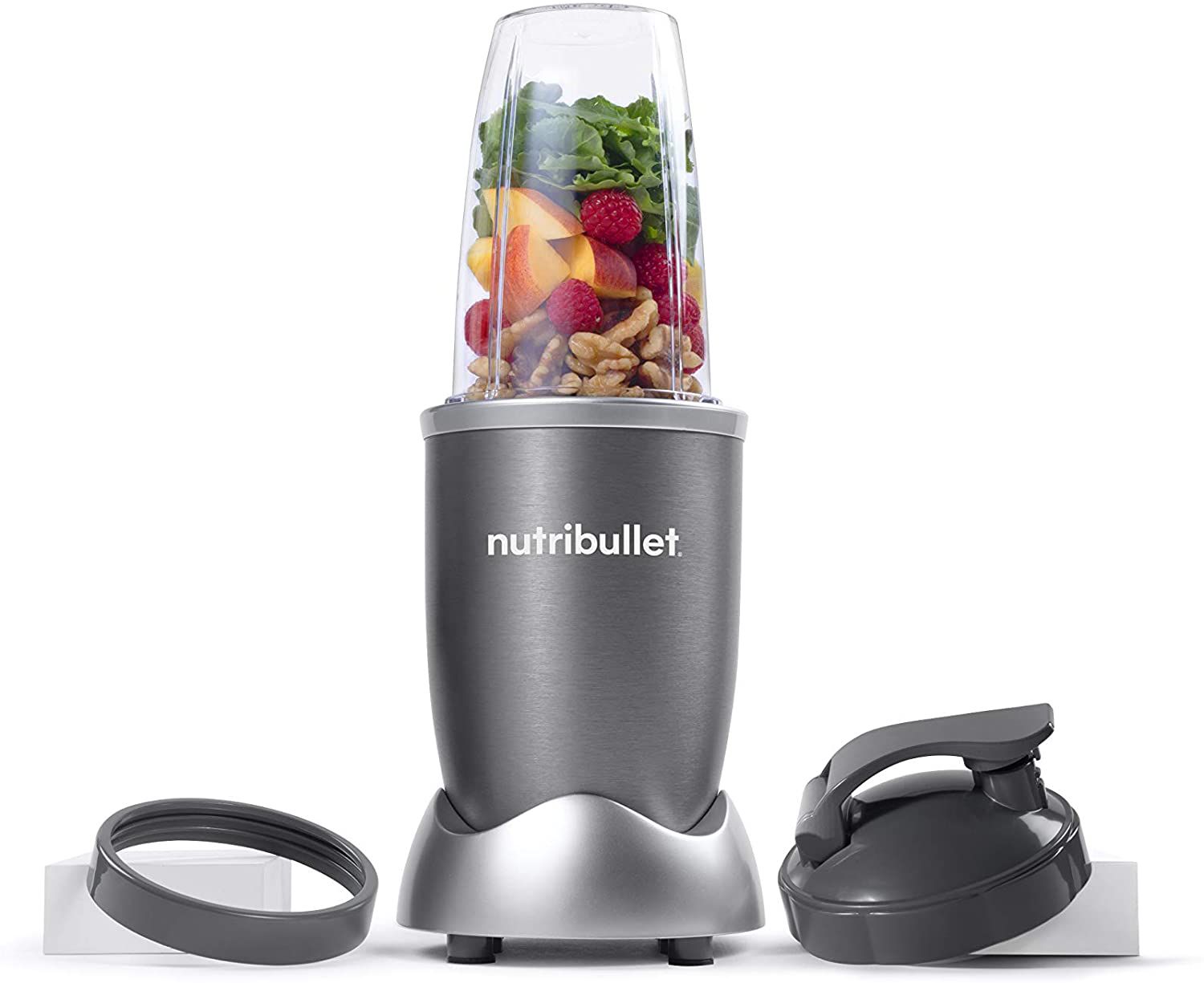 nutribullet blender with fruit inside and accessories
