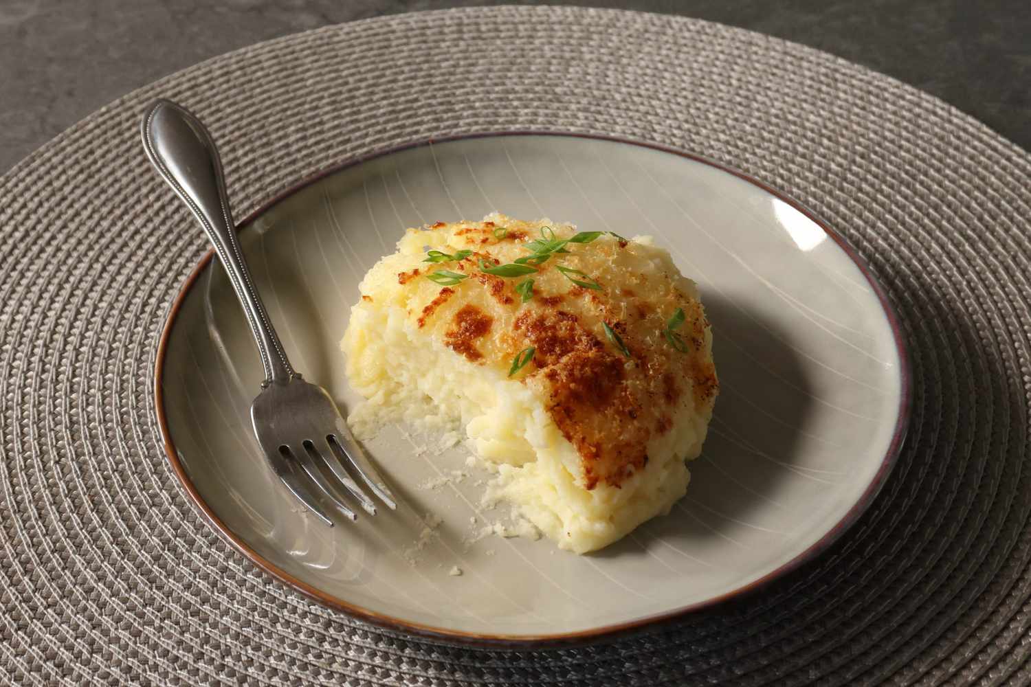 scoop of mashed potato casserole on a plate