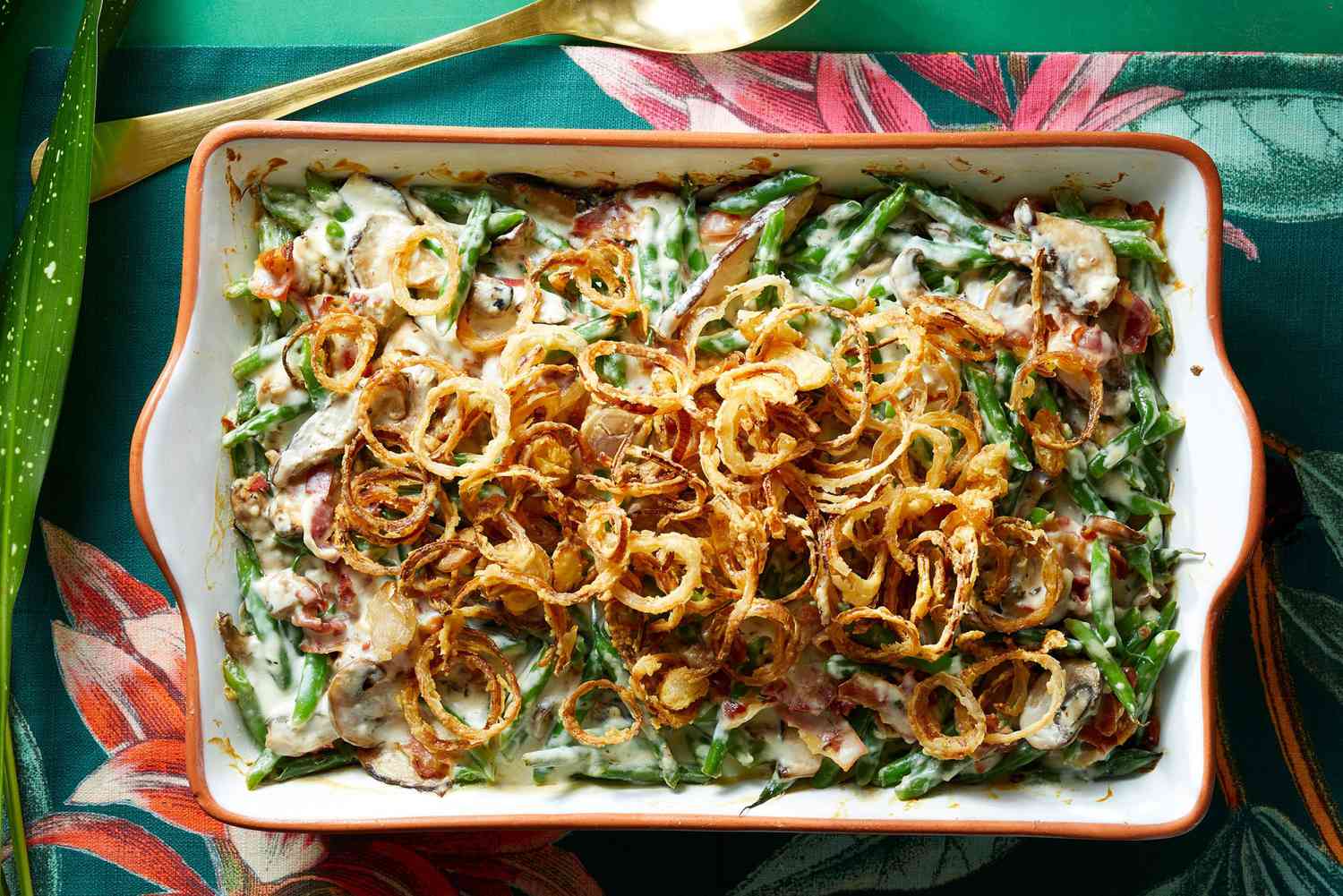 french fried onions atop a creamy green bean casserole