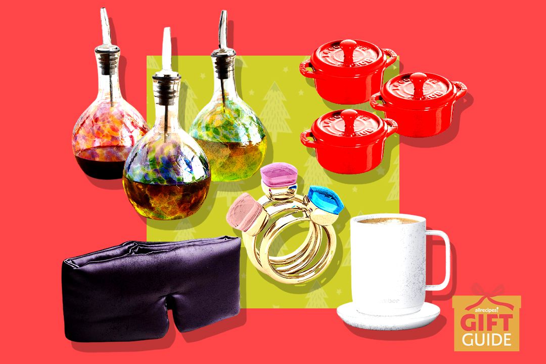 olive oil pourers, staub cocottes, ember mug, eye mask, and rings on red and green background with gift guide logo