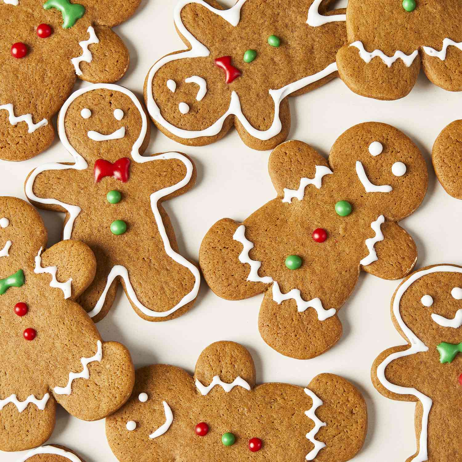 an overhead view of perfectly decorated gingerbread people cookies.